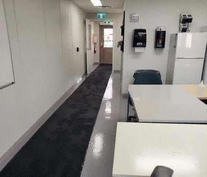 office hallway with black carpet