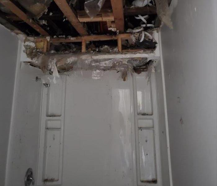 Bathroom ceiling with fire damage